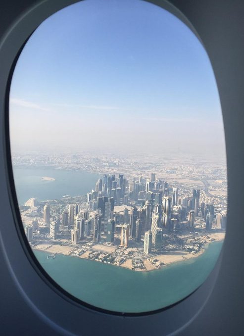 Looking out the airplane window and looking at Downtown Dubai