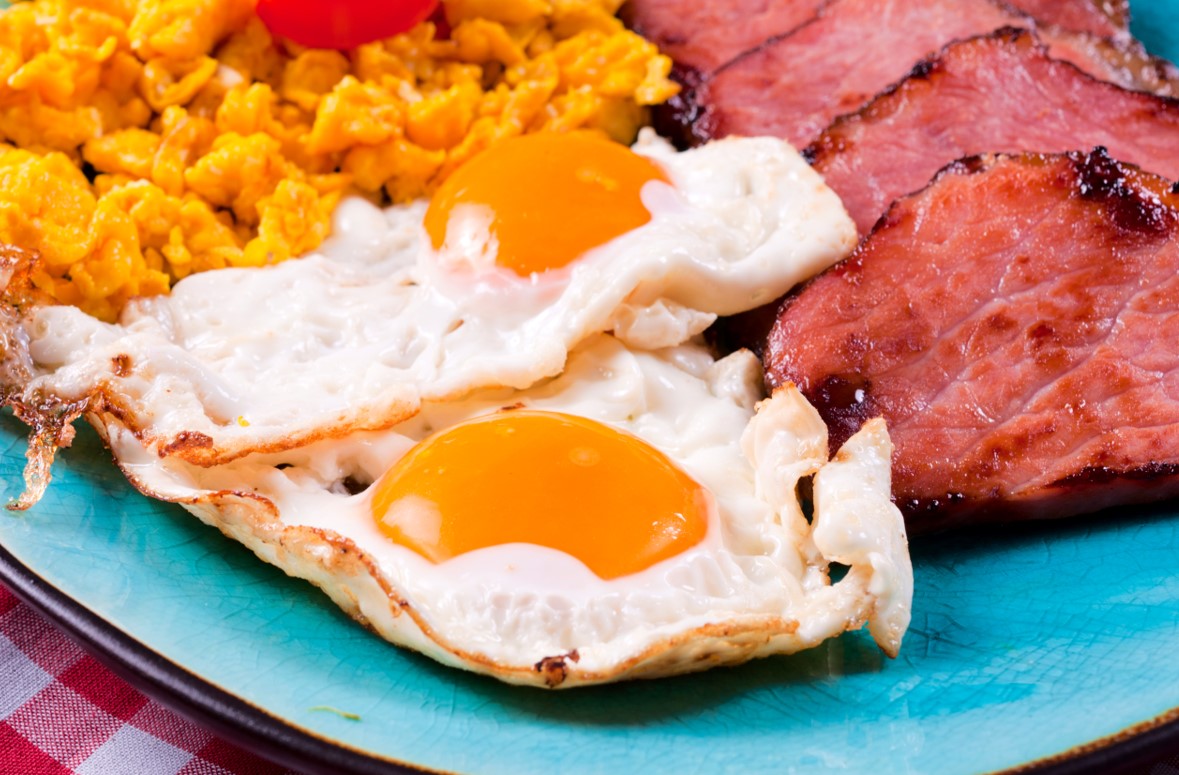 Fried eggs, crispy bacon for breakfast